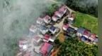 江西德兴：雾绕山村入画来（图）