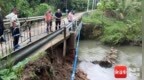 暴雨侵袭致万宁两处道路路基损毁 当地应急封闭管控
