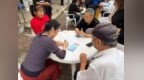栖霞区马群街道南湾营社区开展“书香润重阳 棋牌悦邻里”全民阅读主题活动