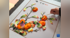 布糊画：丝料堆彩显匠心