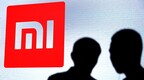 麦格理：将小米集团评级下调至落后大盘