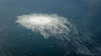 丹麦公布“北溪”管道泄漏现场图！海面形成直径超1公里“气泡圈”