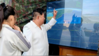 朝鲜导弹总局成功进行新型武器试验，金正恩观摩