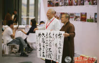 携手多年 同愿同行！明兰法师厦门佛事用品展挥毫泼墨欢喜结缘