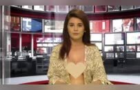 阿尔巴尼亚电视台女主播惹争议，西装内搭空气出镜
