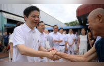 黄循财通过首场大考，新加坡来到十字路口