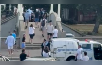 澳海滩恐袭最后6分钟：103声枪响，有人脚踢被制服枪手发泄