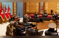 金正恩赠送狙击步枪并一起射击