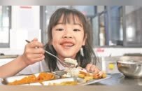 湖口县：九载饭香护苗长（图）