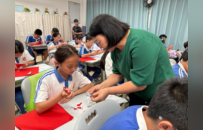 巧手裁红纸，童心续非遗