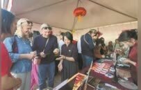 海昏文创亮相法国里昂领事节 文物冰箱贴、立体书成为“文化使者”