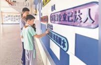 从两个孩子的牵手到一座城市的接力 铜鼓在全县推广“吴亚军帮帮团”