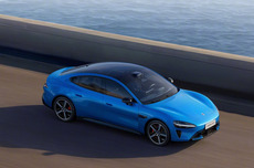 小米集团股价大涨超4% 重返36港元 雷军今日发布新车