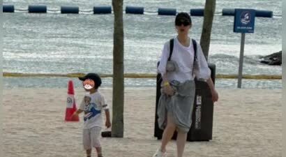 戚薇一家四口返京，10岁的Lucky推着弟弟像个小大人，李承铉则是充当搬运工