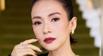 章子怡深V黑裙造型惊艳亮相，金镯金链加持尽显奢华贵气