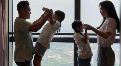 熊黛林庆祝结婚9周年，一家四口幸福同框，双胞胎女儿全是小长腿