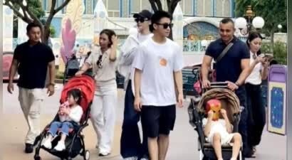 奚梦瑶全家在迪士尼！女儿正脸曝光鼻子有点塌，保姆保镖时刻跟着