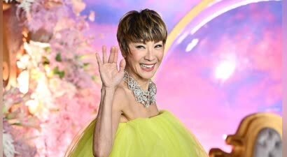 杨紫琼绿色蓬蓬裙配精灵短发灵动俏皮