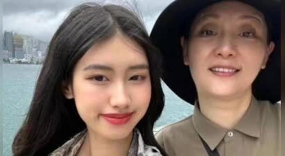 徐帆机场送女儿穿褐色大衣，母女间互动引争议，网友直接吵翻