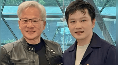 樊振东晒出与英伟达创始人合影 两人注视镜头笑容满面