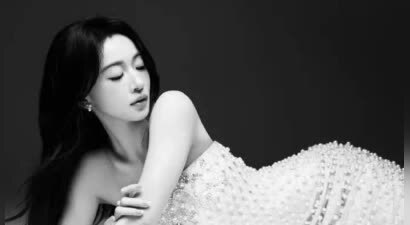 吴谨言穿白色抹胸裙 气质优雅身材曼妙