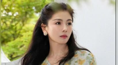 刘涛公开生日写真大片 浅绿印花长裙气质清爽貌美