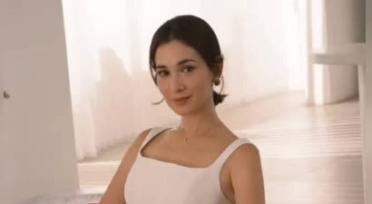 卢靖姗吊带白裙出镜 温婉知性
