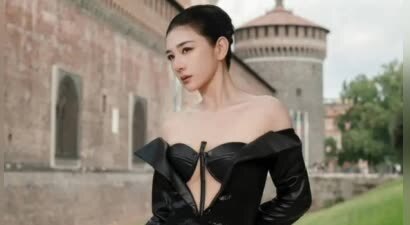 黄奕穿黑亮皮裙优雅大气