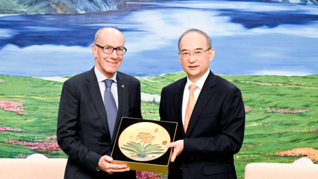 黄强胡玉亭会见国际大学生体育联合会主席雷诺·艾德