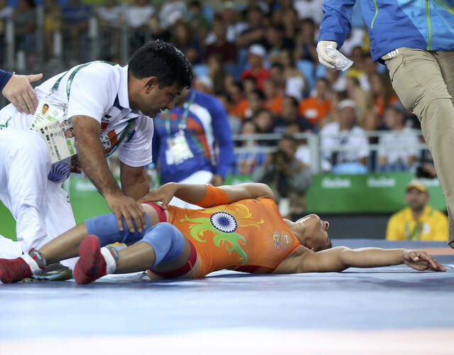 里约奥运会摔跤尴尬图片