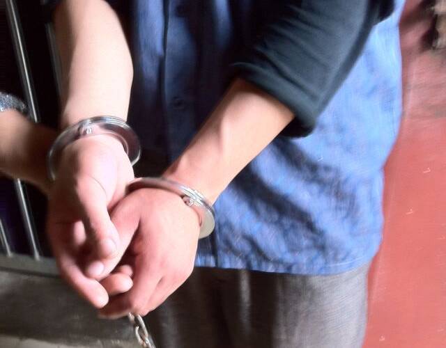 被抓获的犯罪嫌疑人.