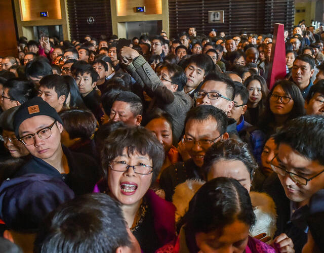 被房子绑住的中国人