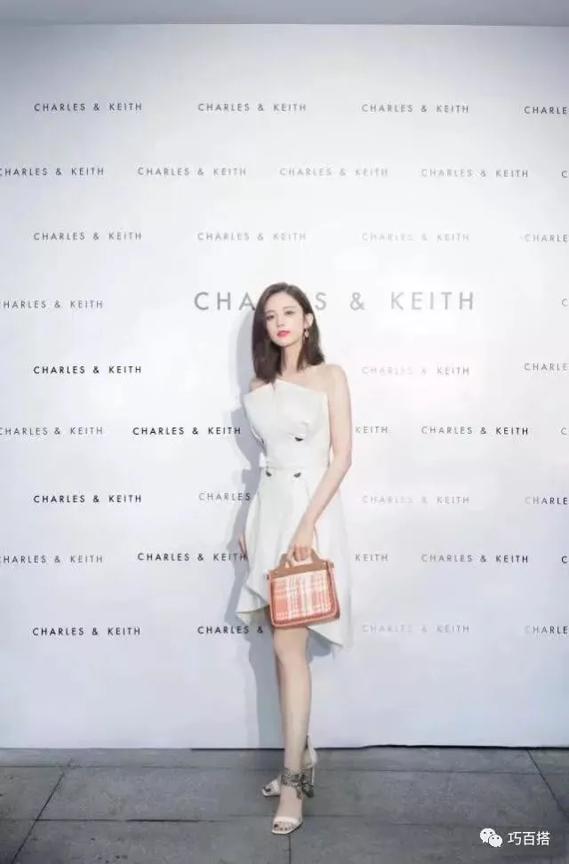 “腿精”古力娜扎现身，吊带半裙配双丸子头，终于见识了什么叫美-古力娜扎穿吊带黑裙照片