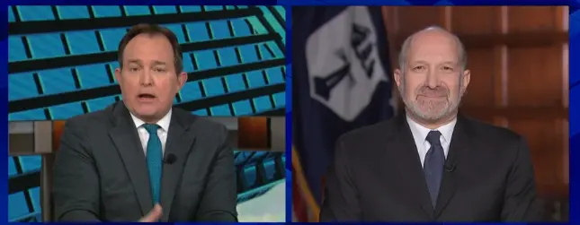 美国商务部长卢特尼克（右）接受CNBC采访。 视频截图