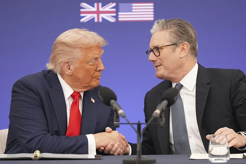 △特朗普与斯塔默（资料图）